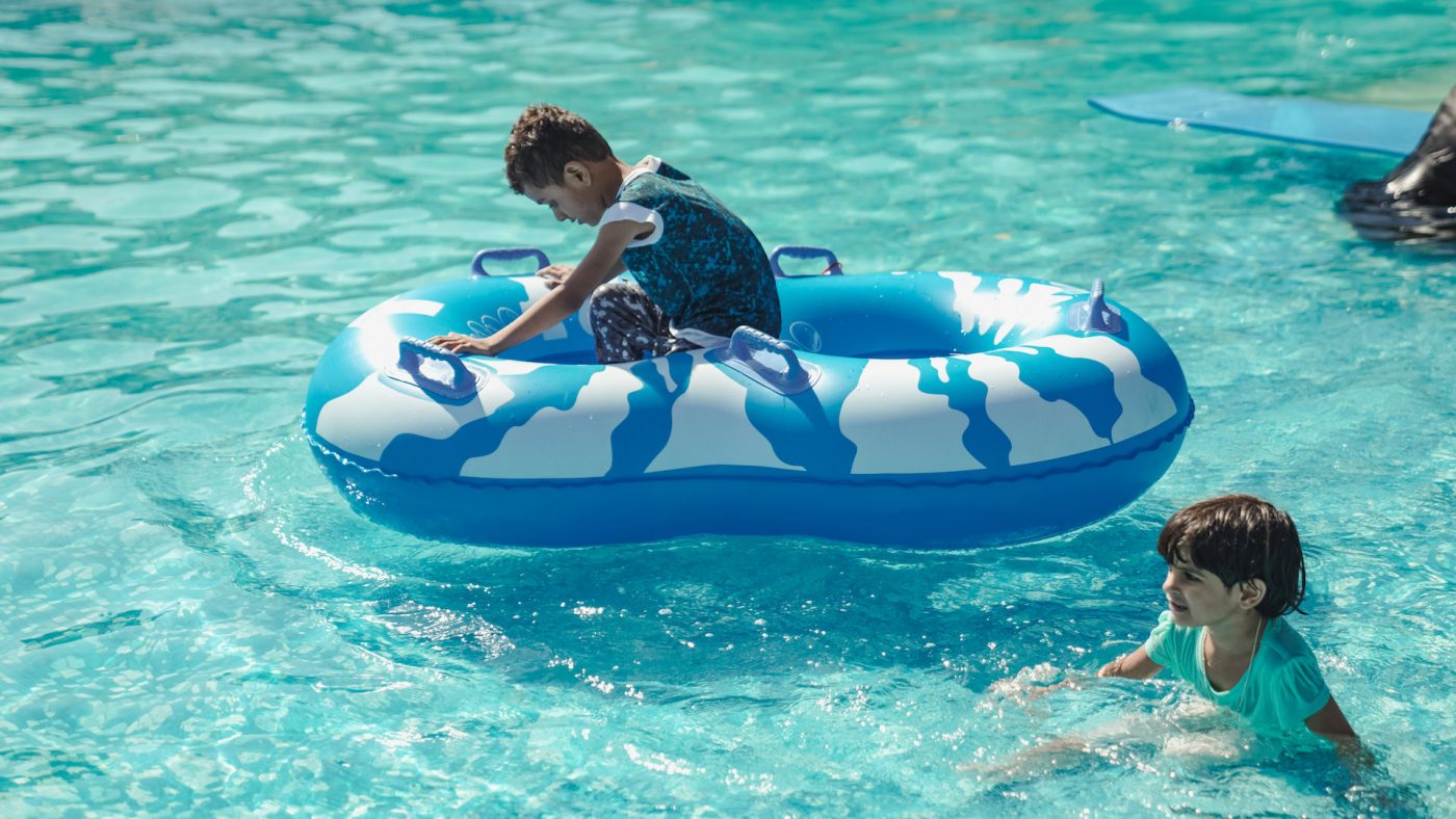 Child enjoying a fun ring ride